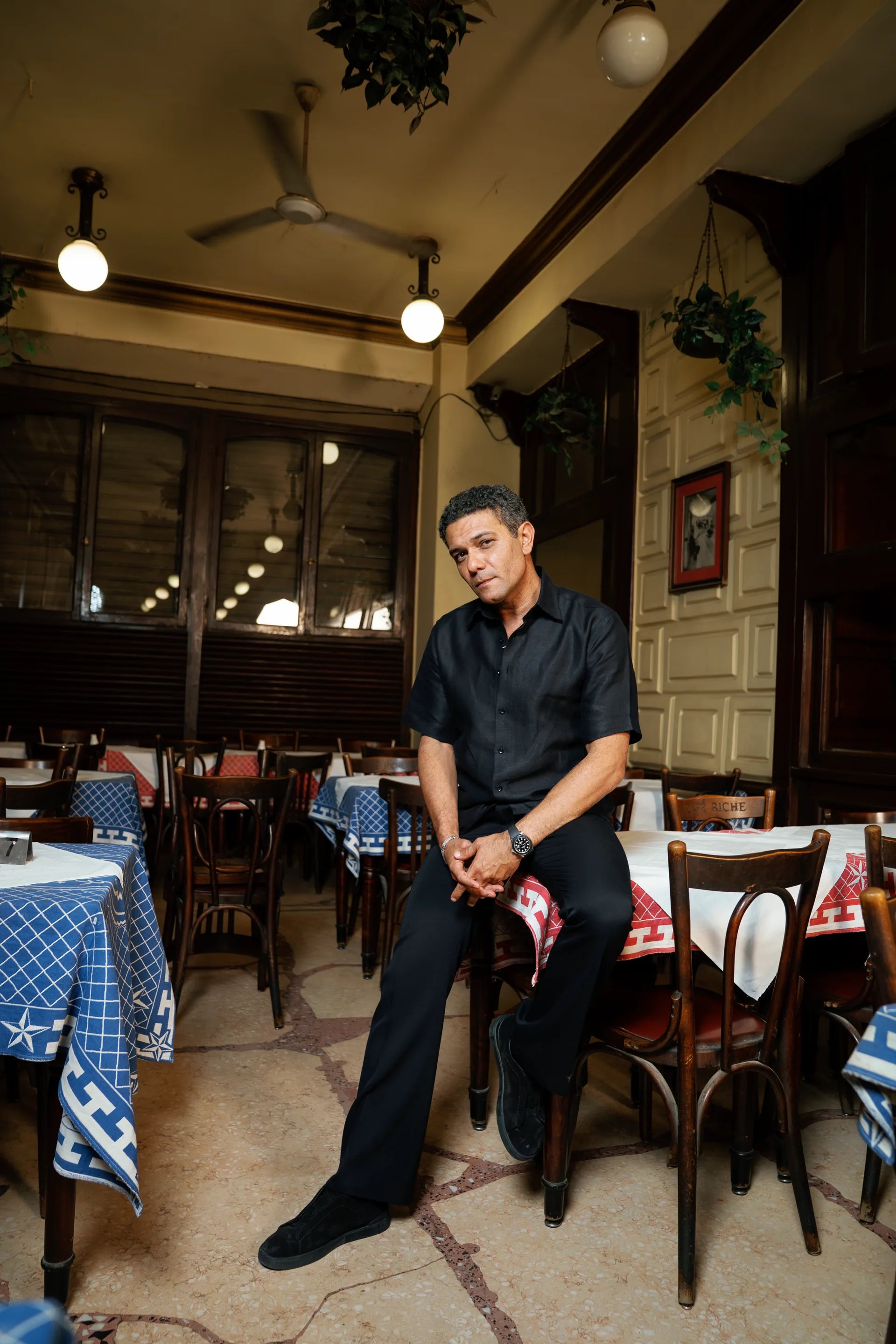 Man seated in a historic Cairo cafe